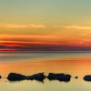 Great Lake Lighthouse Sunrise with Rocks - Duluth, Minnesota