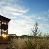 A guard tower at the Heart Mountain Interpretive Learning Center outside of Cody, Wyoming. From 1942 to 1945, nearly 14,000 Americans of Japanese ancestry were imprisoned at the Heart Mountain Relocation Center - one of 10 War Relocation Authority (WRA) concentration camps. Photo by Kevin J. Miyazaki